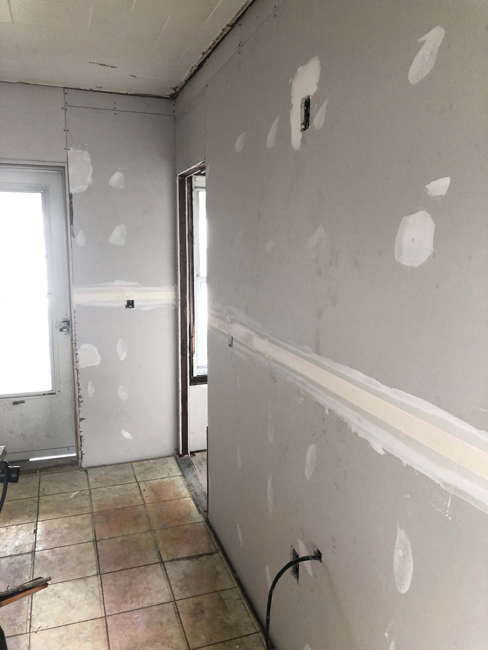 1st coat drywall taping